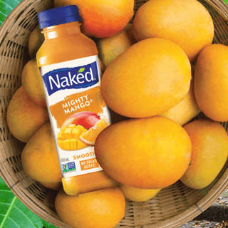 Naked mango flavoured bottle with multiple fresh mango fruits in a basket